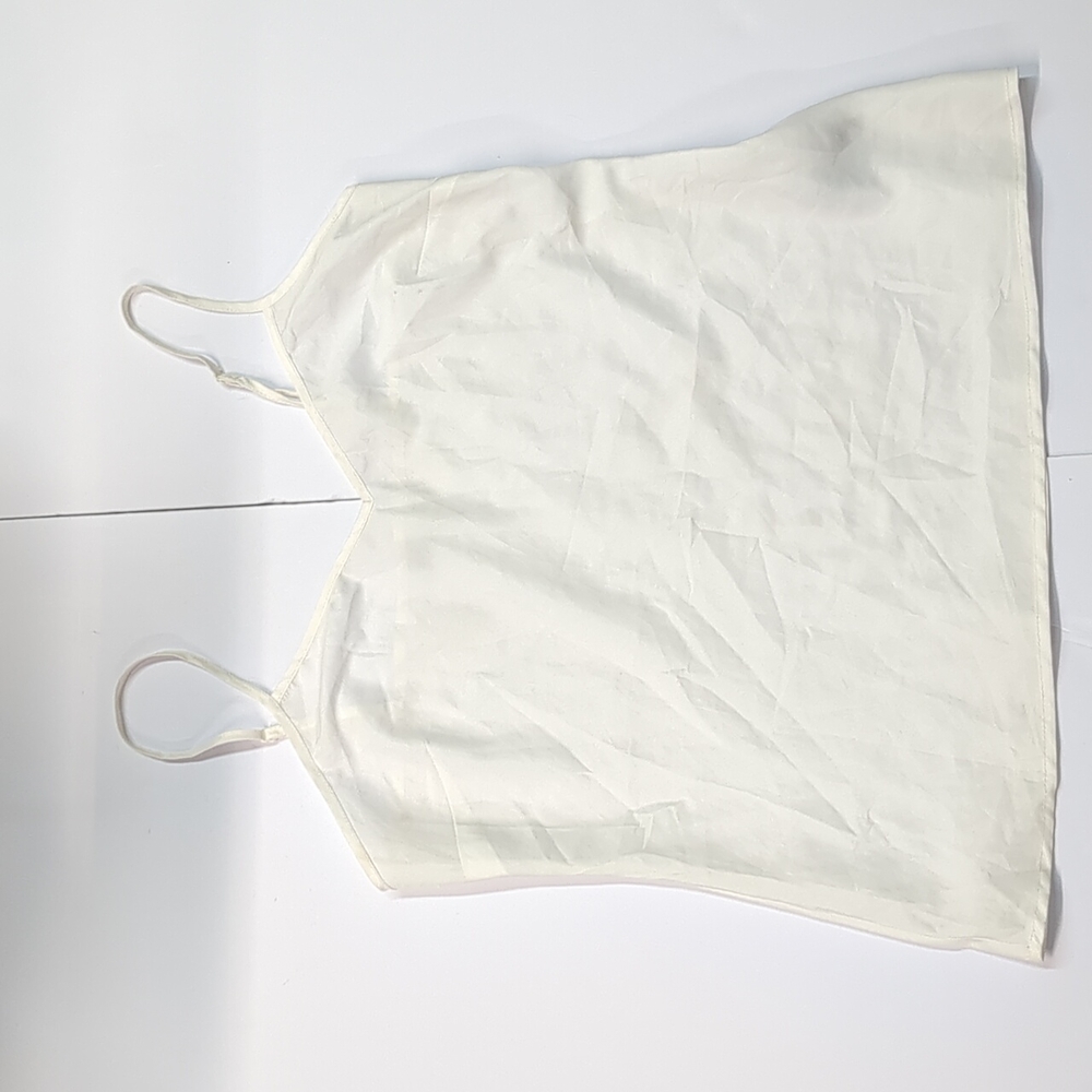White slip top - like satin material. Medium